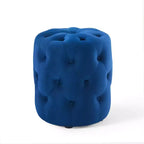 Pouf rond capitonné en velours performant