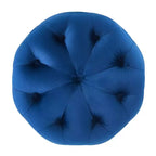 Pouf rond capitonné en velours performant