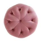 Pouf rond capitonné en velours performant