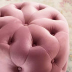 Pouf rond capitonné en velours performant